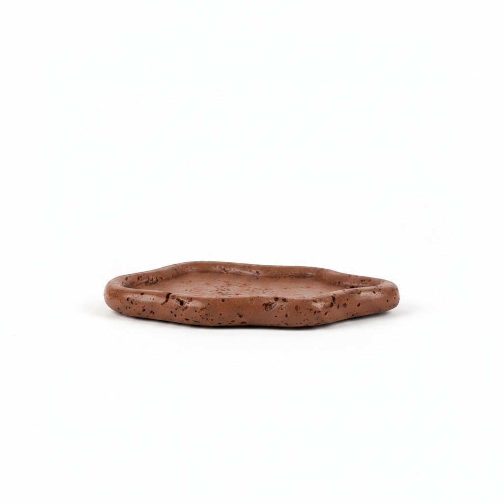 Solace & Smoke Lunar Tray in brown, a handcrafted Jesmonite dish with a rounded silhouette and textured finish.