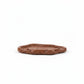 Solace & Smoke Lunar Tray in brown, a handcrafted Jesmonite dish with a rounded silhouette and textured finish.