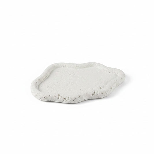 Solace & Smoke Lunar Tray in cloud stone Jesmonite, a shallow, rounded tray with a raised edge and textured finish.