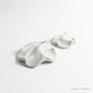 Solace & Smoke white textured ceramic petal-shaped dishes for jewelry or trinkets.