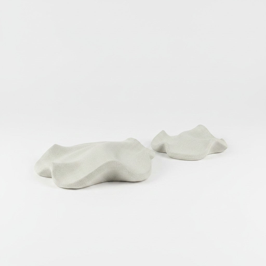 Solace & Smoke matte white textured sculpted wave decorative tray. Organic, flowing form adds modern artistry.