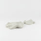 Solace & Smoke matte white textured sculpted wave decorative tray. Organic, flowing form adds modern artistry.